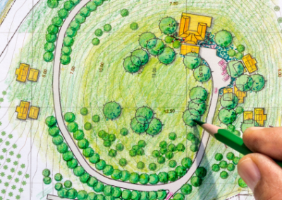 Drawing of landscape plan on paper with 3D imaging CAD design.